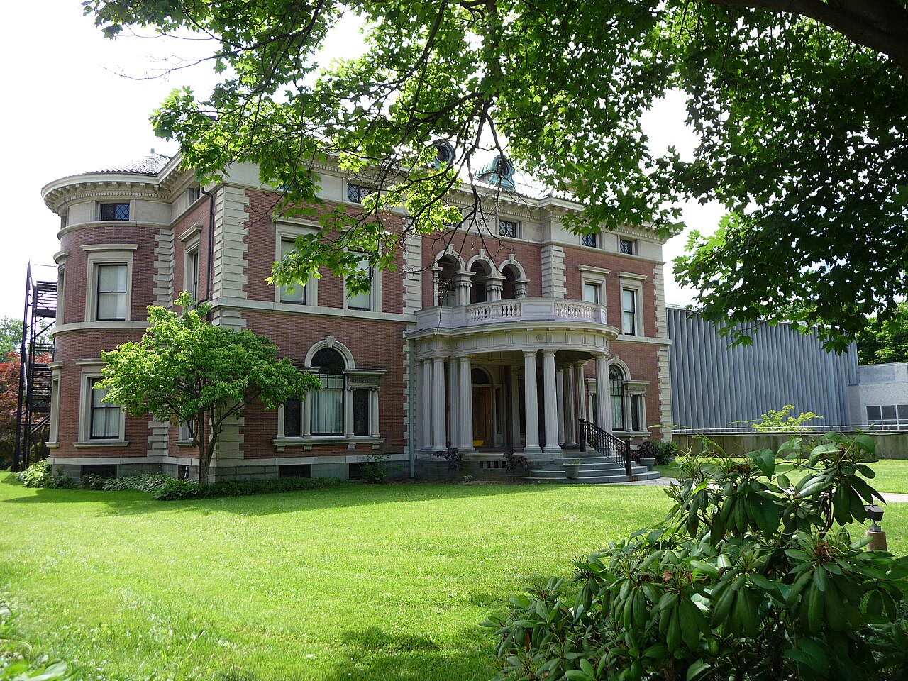 The 1904 Roberson Mansion on Front Street with a wing of the Roberson Museum and Science Center.